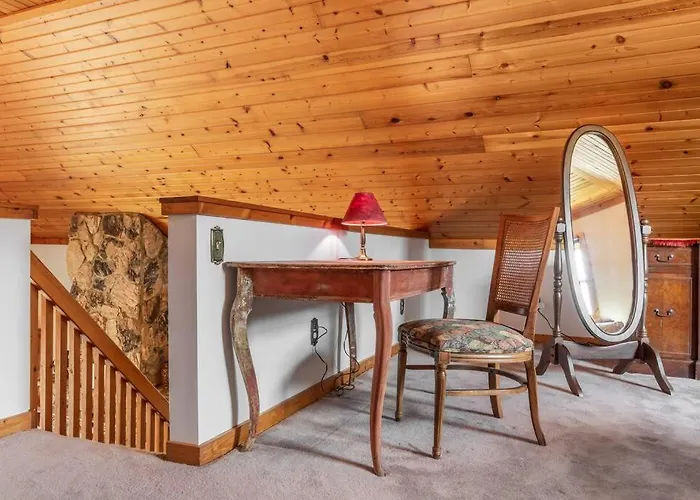 Quaint Riverfront Barn Chalet